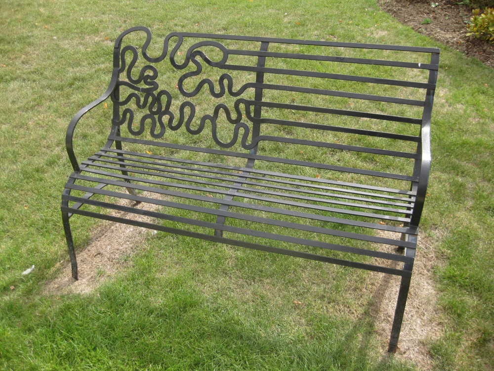 Decorative wrought iron bench