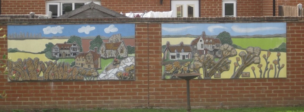 Mosaic of rural houses installed on a wall