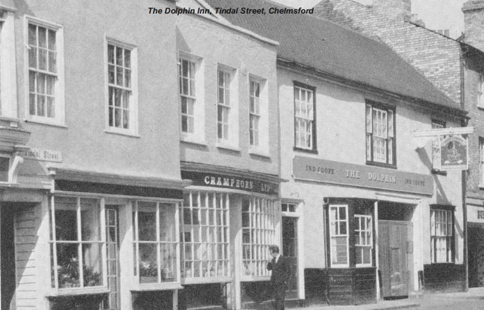 Row of shops and businesses, including The Dolphin Inn