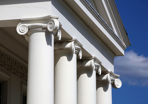 Four white Ionic columns at front of Hylands House