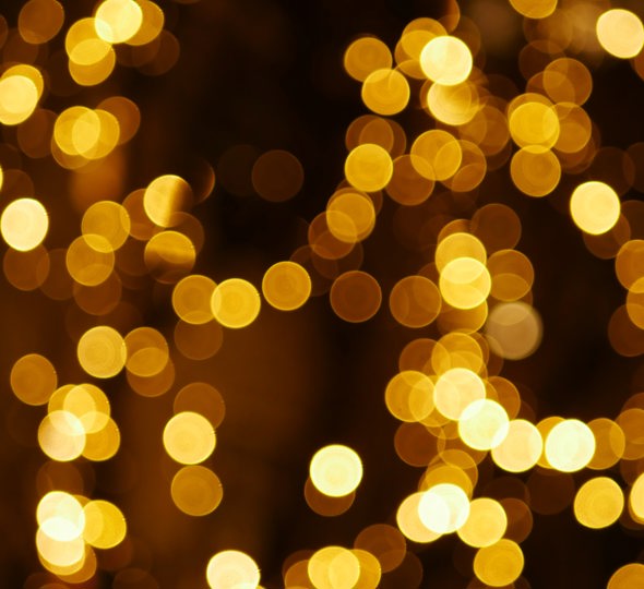 Golden Christmas lights with bokeh effect (Photo by Karine Germain)