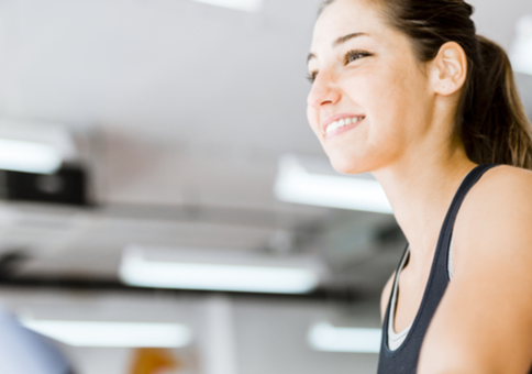 Smiling woman at the gym