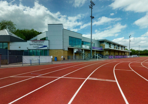 Red athletics track overlooked by the centre