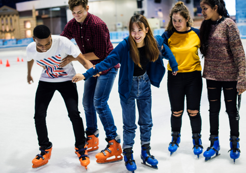 Group of young people ice skating