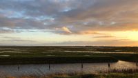 A sunset over an estuary.  preview