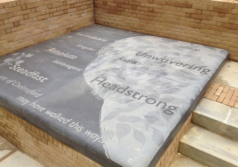 Word engraved into stone step, such as 'unwavering', 'solid' and 'headstrong'